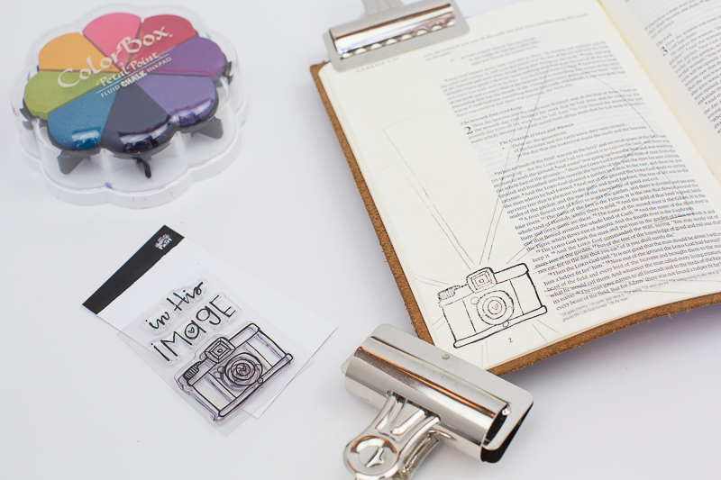 Amy Bruce is sharing with us her step by step process in creating this mixed media art journaling Bible page about being made to shine in His image