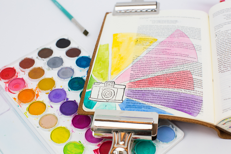 Amy Bruce is sharing with us her step by step process in creating this mixed media art journaling Bible page about being made to shine in His image