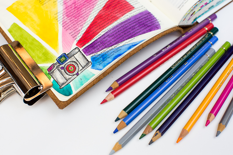 Amy Bruce is sharing with us her step by step process in creating this mixed media art journaling Bible page about being made to shine in His image