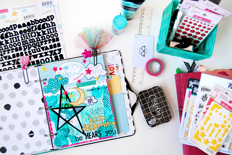 Elaine is sharing with us about dreaming big with God and her mixed media art journal page in her Illustrated Faith Praise Book