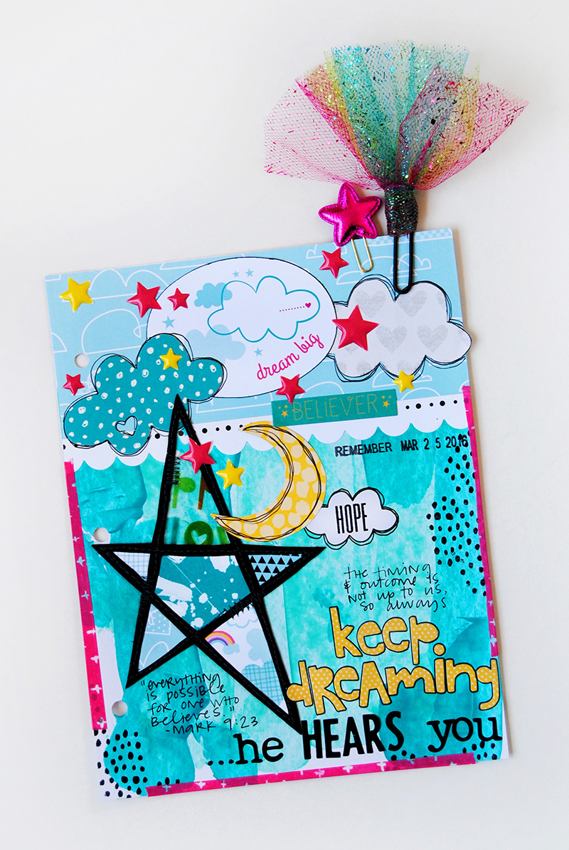 Elaine is sharing with us about dreaming big with God and her mixed media art journal page in her Illustrated Faith Praise Book
