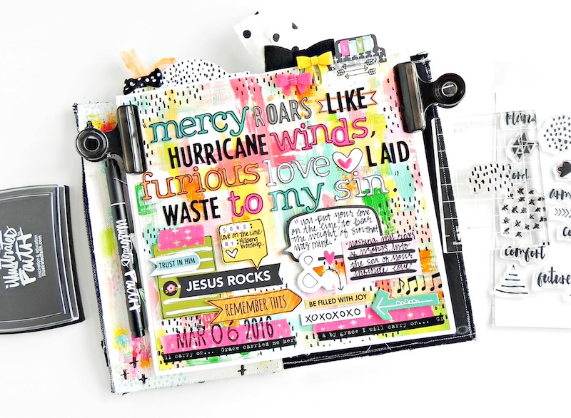 Stephanie Buice is sharing her mixed media art journal inspired by the song Love On The Line and walks us through her process for it