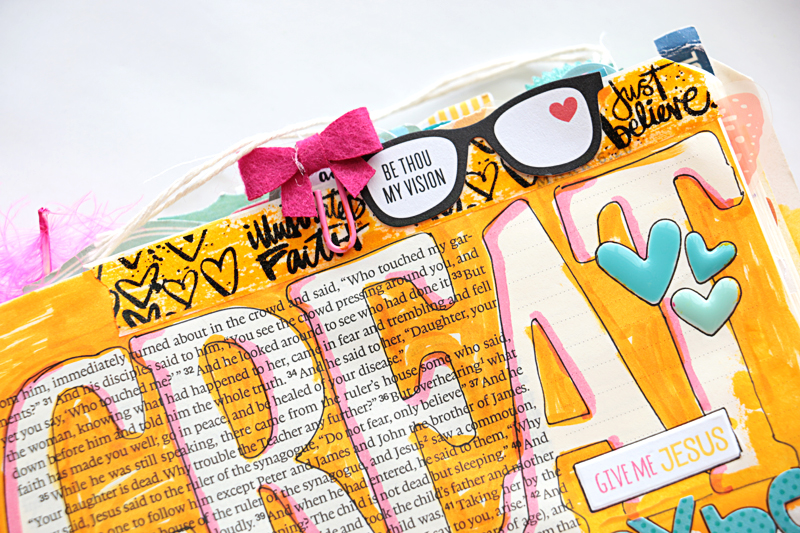 Natalie shares a process video showing some fun techniques such as how to get a giant title into your journaling bible, as well as a masking and painting tip to create colourful journaling lines