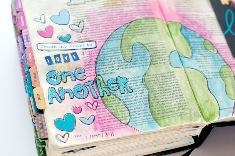 mixed media art journaling Bible page and message of how God calls us to love beyond our religion, beyond the borders of our country, beyond our comfort zone | Jess Robyn