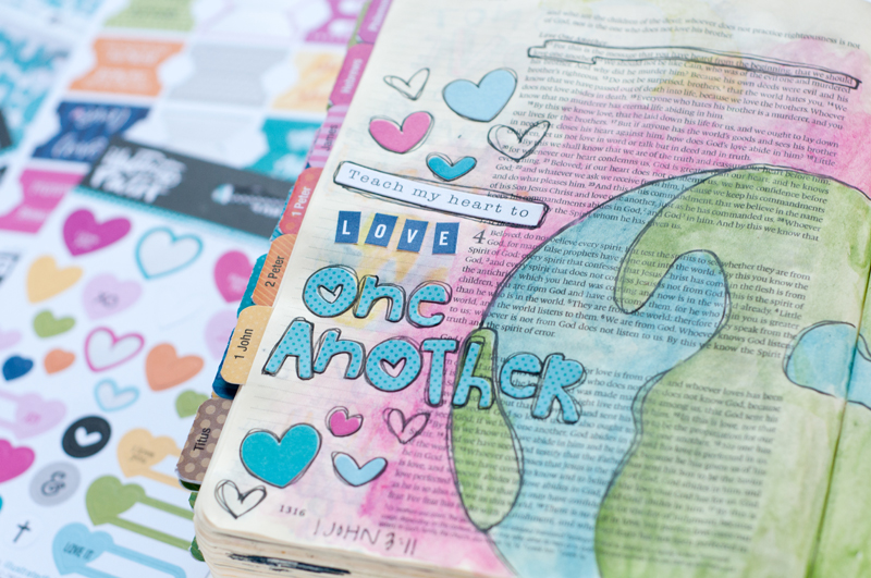 mixed media art journaling Bible page and message of how God calls us to love beyond our religion, beyond the borders of our country, beyond our comfort zone | Jess Robyn