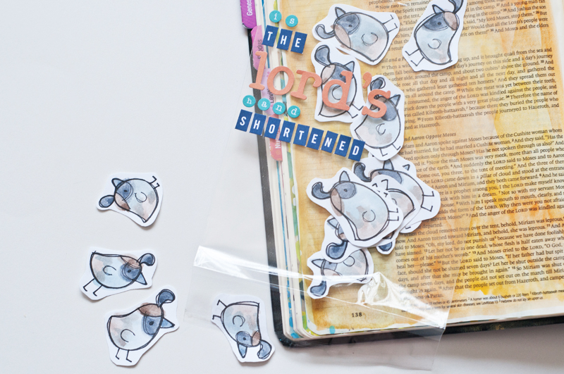 shaker card filled with quail representing the abundance of God's provisions and message by Jess Robyn | mixed media art journaling Bible | Illustrated Faith by Bella Blvd Genesis Collection