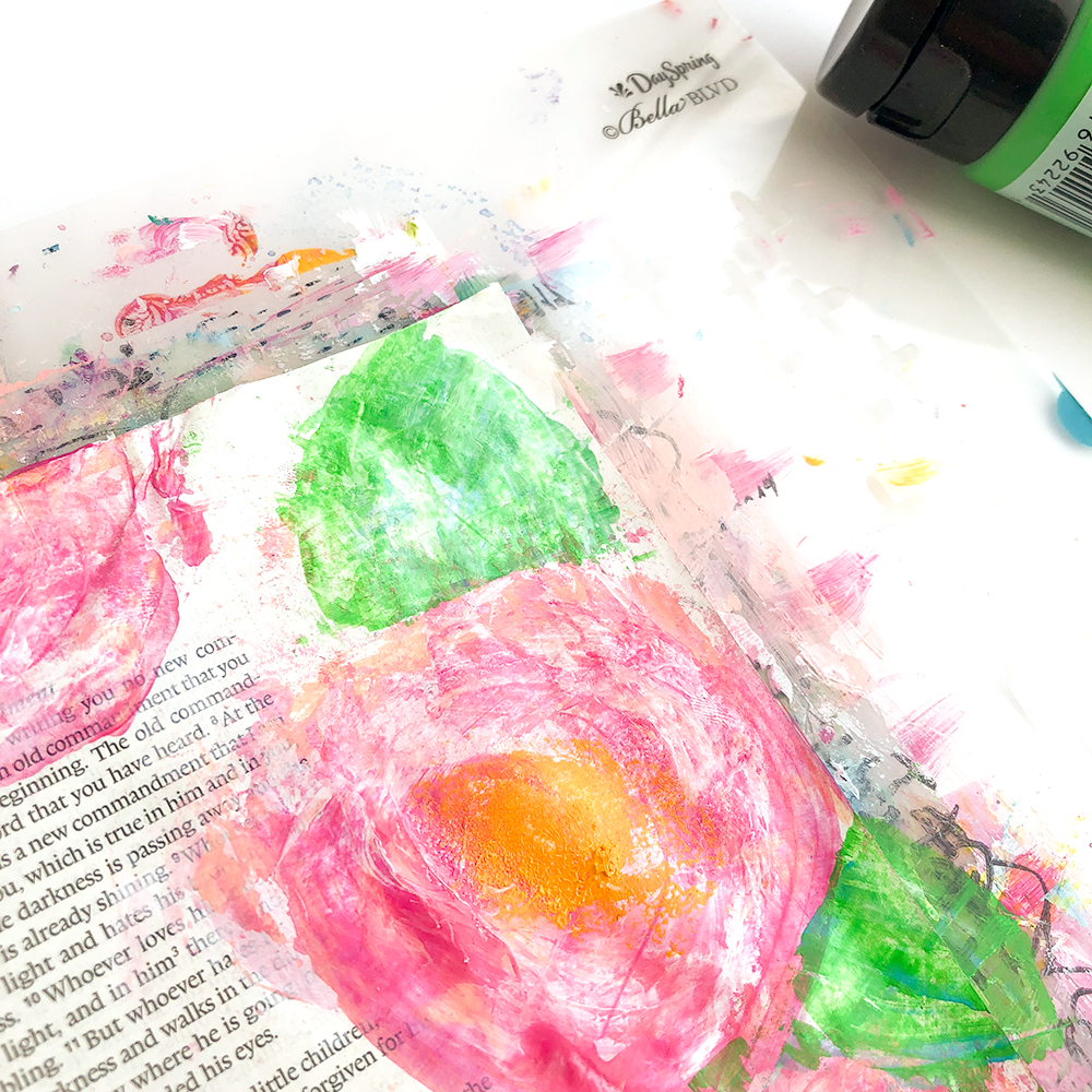 mixed media Bible journaling tutorial by Heather Greenwood | scraping paint in curved shapes to create flowers