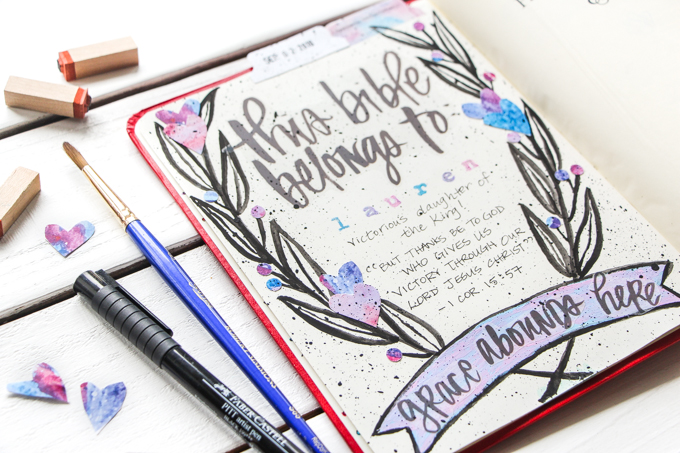 "This Bible Belongs To" Page: Journaling Bible Process Video | Lauren Lanker is back with another blog post and process video using her Permission Pages Devotional Kit–this time to create a "This Bible Belongs To" Page at the front of her Bible that says so much more than just her name. It speaks to our identity in Christ! When we remember who we are because of who God is, all our fears about "messing up" a page in our Journaling Bible fade away. Great for beginners!