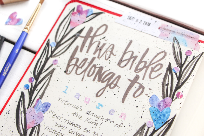 "This Bible Belongs To" Page: Journaling Bible Process Video | Lauren Lanker is back with another blog post and process video using her Permission Pages Devotional Kit–this time to create a "This Bible Belongs To" Page at the front of her Bible that says so much more than just her name. It speaks to our identity in Christ! When we remember who we are because of who God is, all our fears about "messing up" a page in our Journaling Bible fade away. Great for beginners!